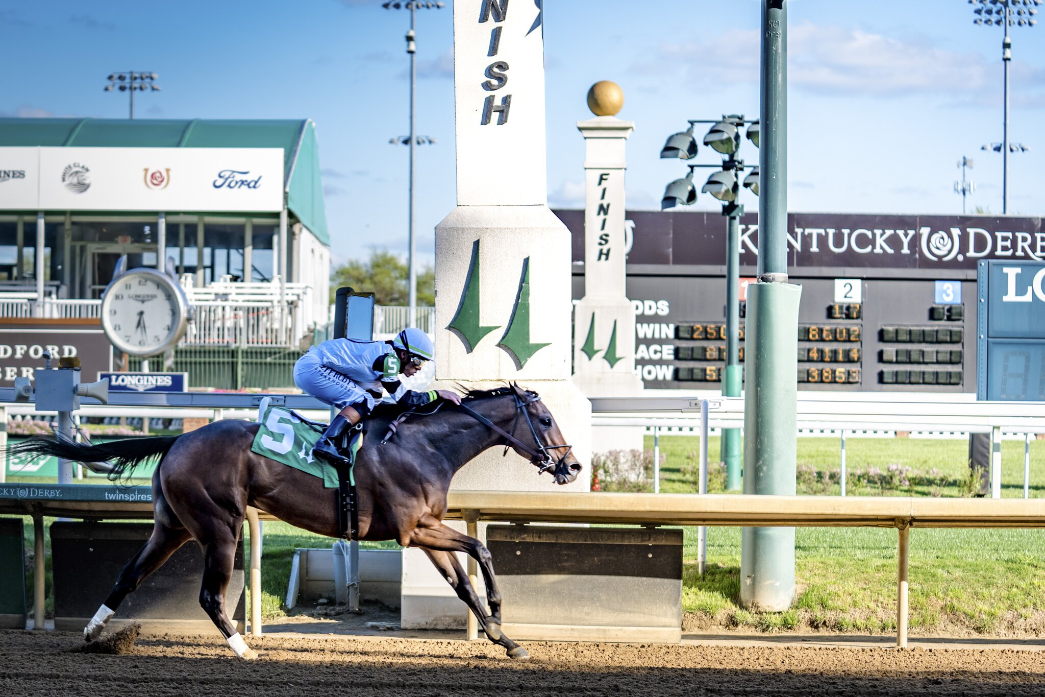 Scene from Churchill Downs during a past race, reflecting the tradition and pageantry of America’s iconic horse racing event