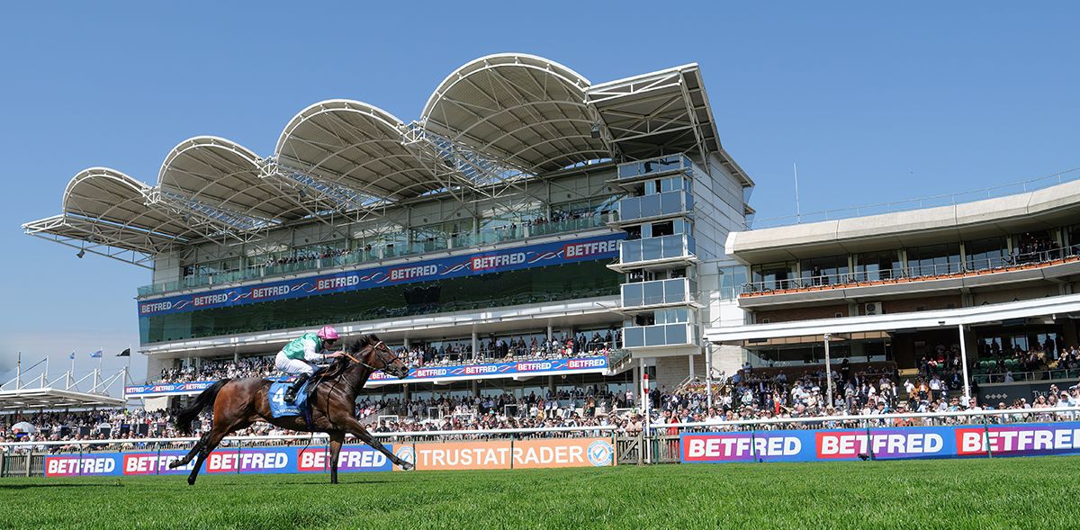 Cosmic Year surging ahead of Marvelman to win the Trustatrader King Charles II Stakes at Newmarket