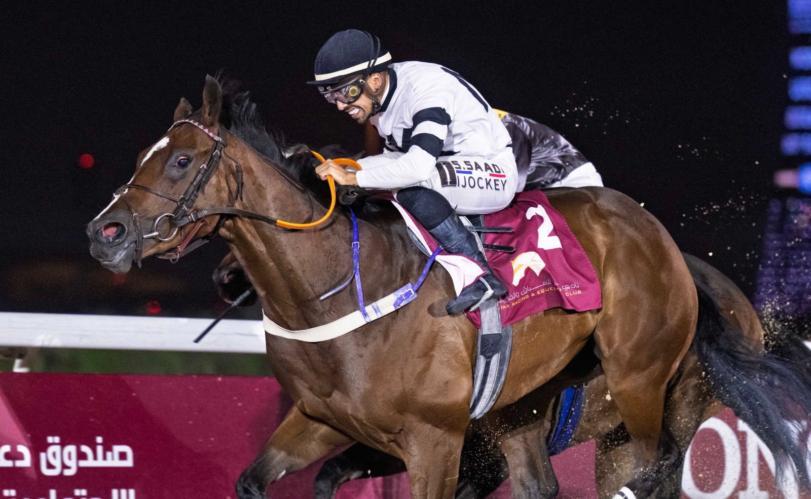 Billboard Star surges past Weissmuller under jockey Soufiane Saadi to win the Ain Khaled Cup at Al Rayyan Racecourse on 7th May 2025.