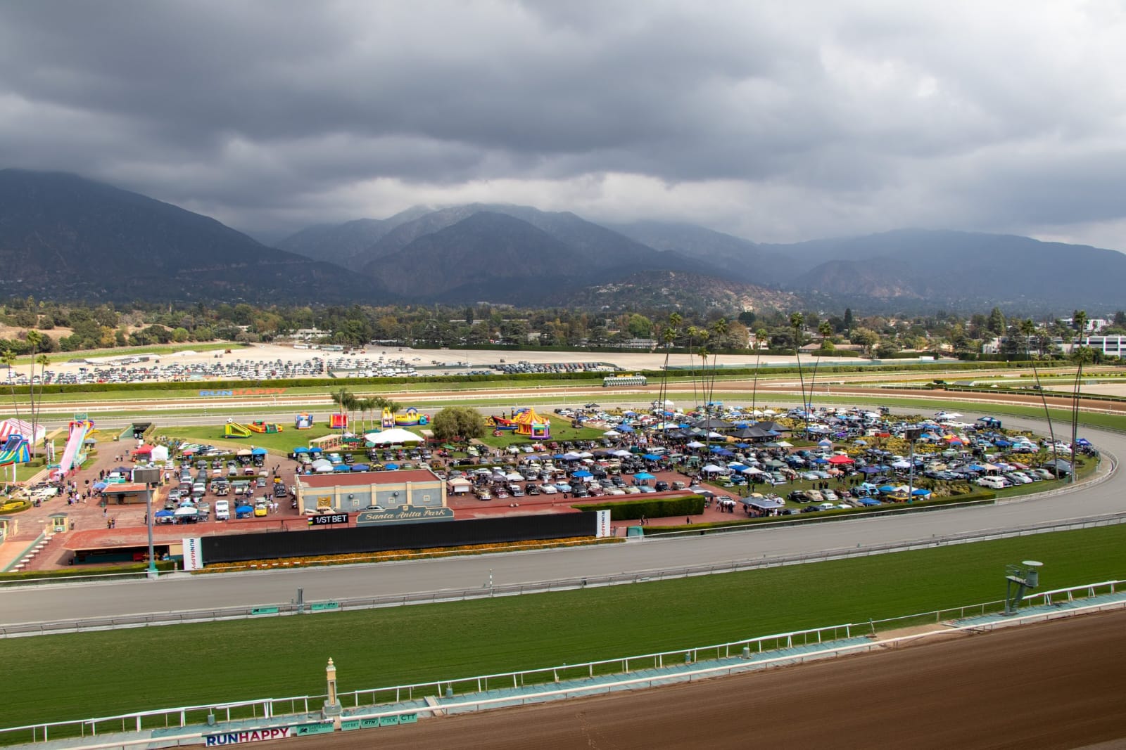 Racehorses at Santa Anita Park preparing for the May 16, 2025 race card under sunny California skie