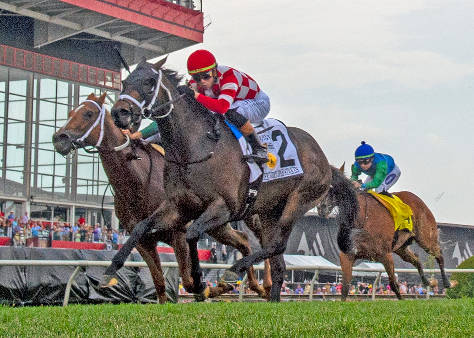 Bosserati and jockey Irad Ortiz Jr. leading in the final stretch to win The Very One Stakes at Pimlico Race Course on Black-Eyed Susan Day.
