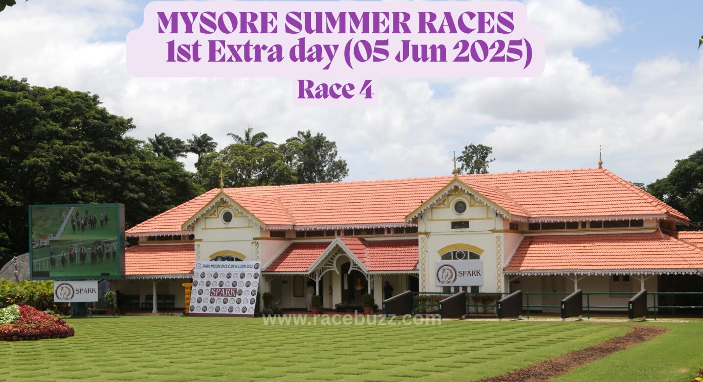 Mysore Race Club paddock area during the Mysore Summer Races 2025 extra race day on June 5, showing the main building, sponsor banners, and a large screen with race footage, set against a clear sky and lush greenery.