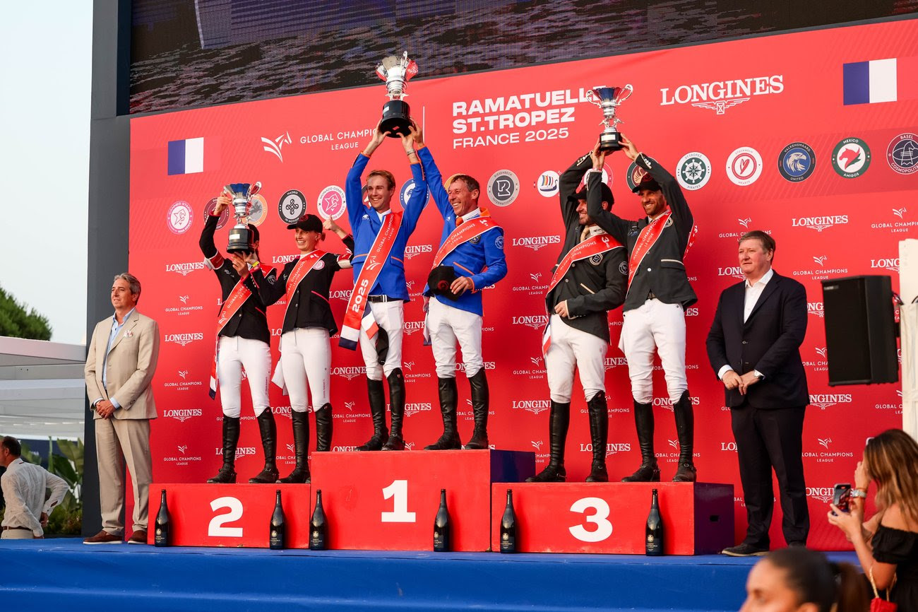 Valkenswaard United riders celebrating their win at the GCL Ramatuelle 2025 against the scenic backdrop of St. Tropez.