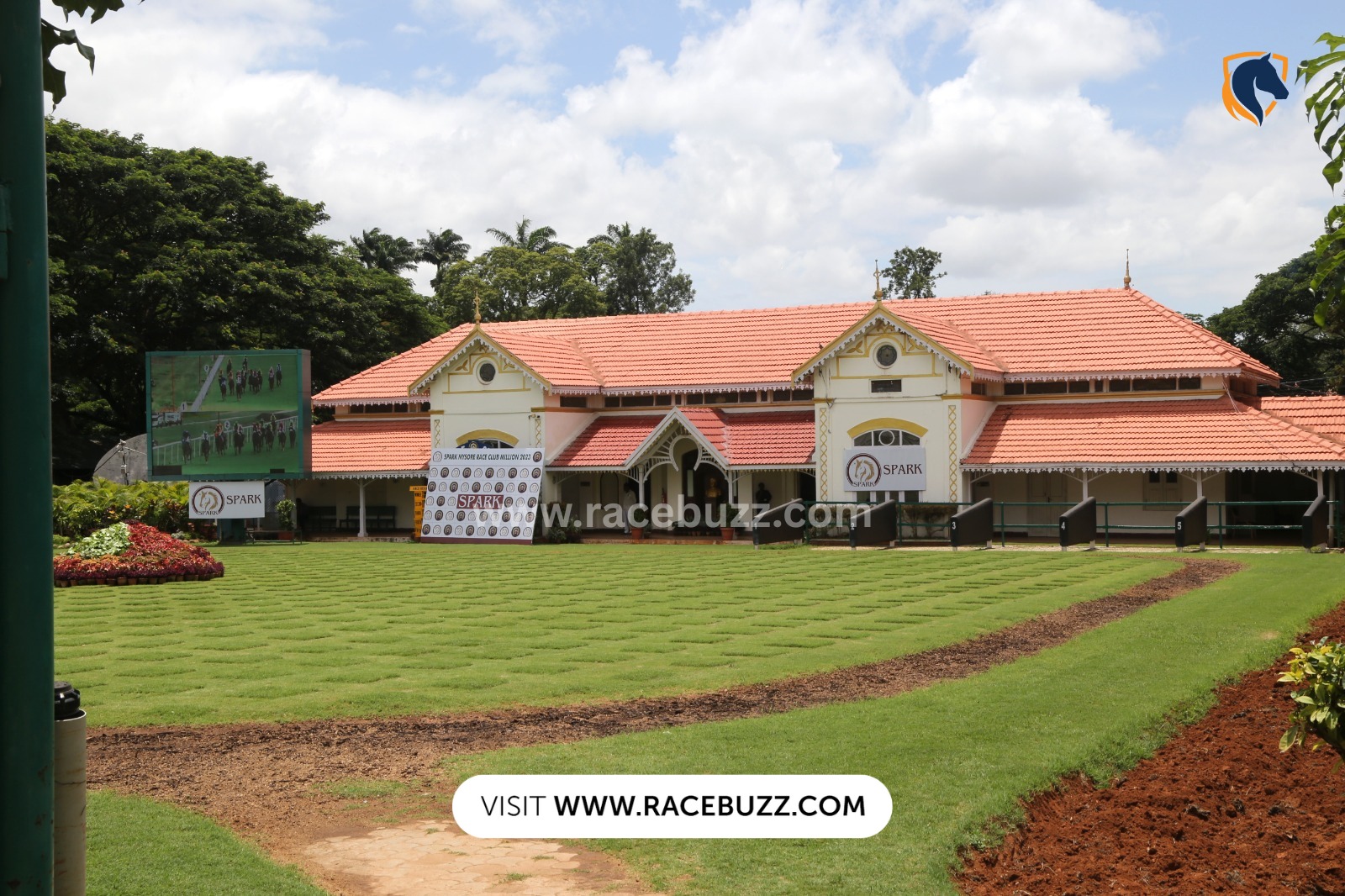 Horses competing at the Mysore Race Club during the 2025 Summer Meeting, showcasing competitive racing action.