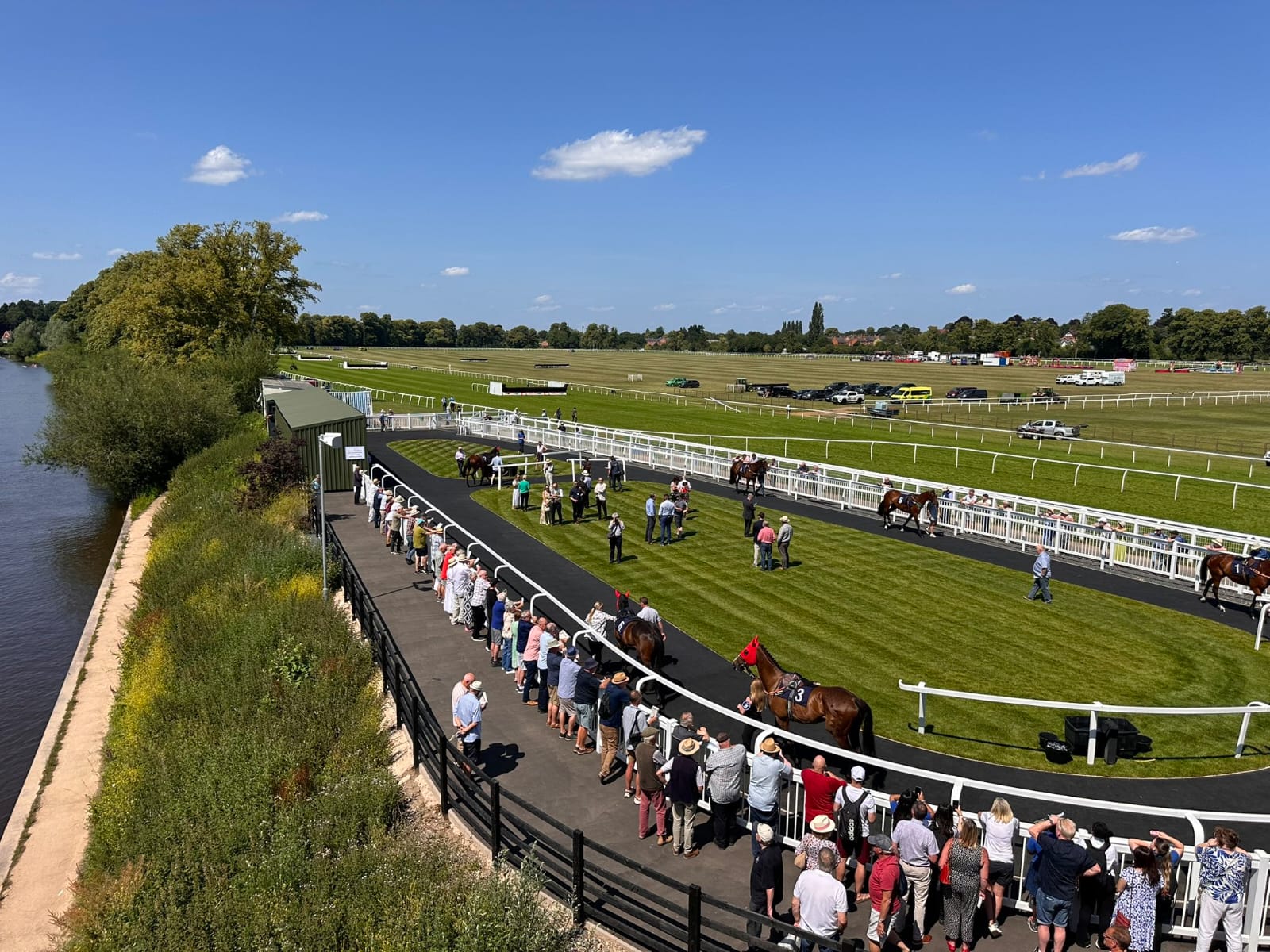 Horses in action over hurdles at Worcester Racecourse during Summer Afternoon Racing