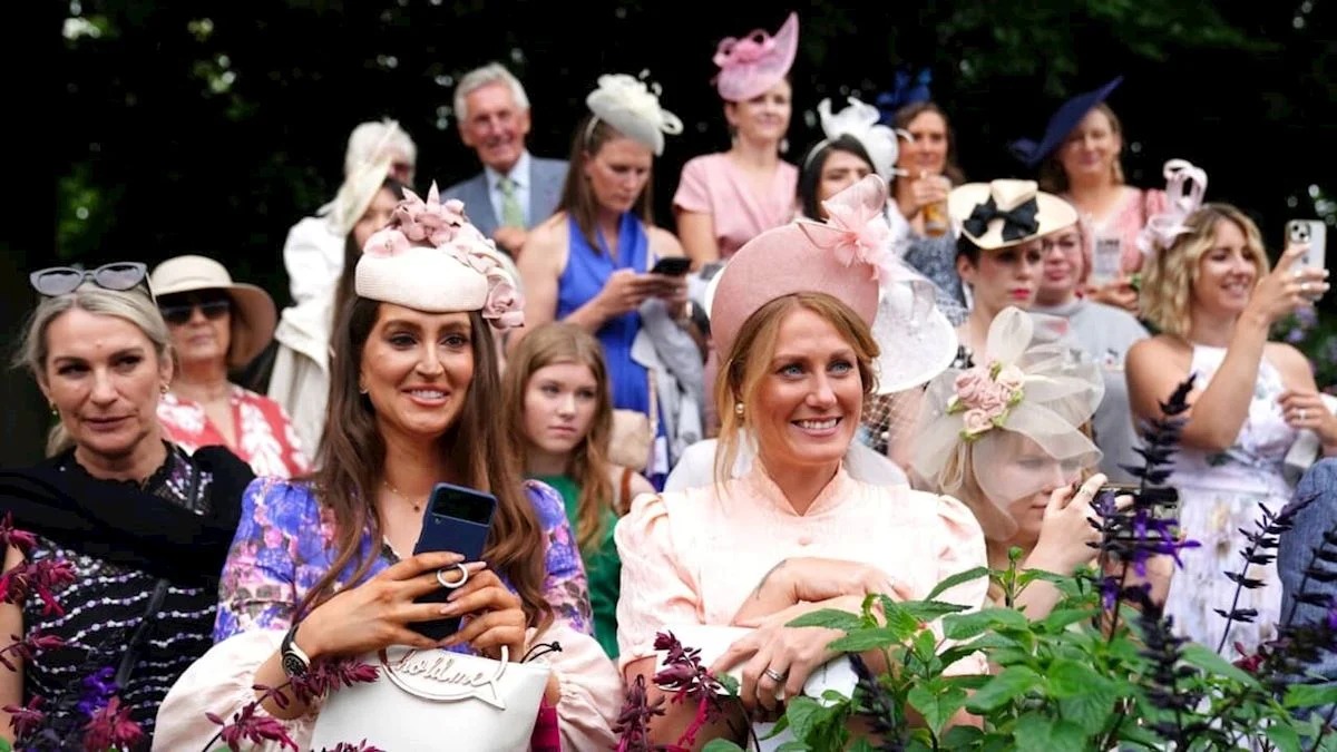 Elegantly dressed racegoers at Newmarket Racecourse during the Debenhams July Festival 2025 on Ladies Day