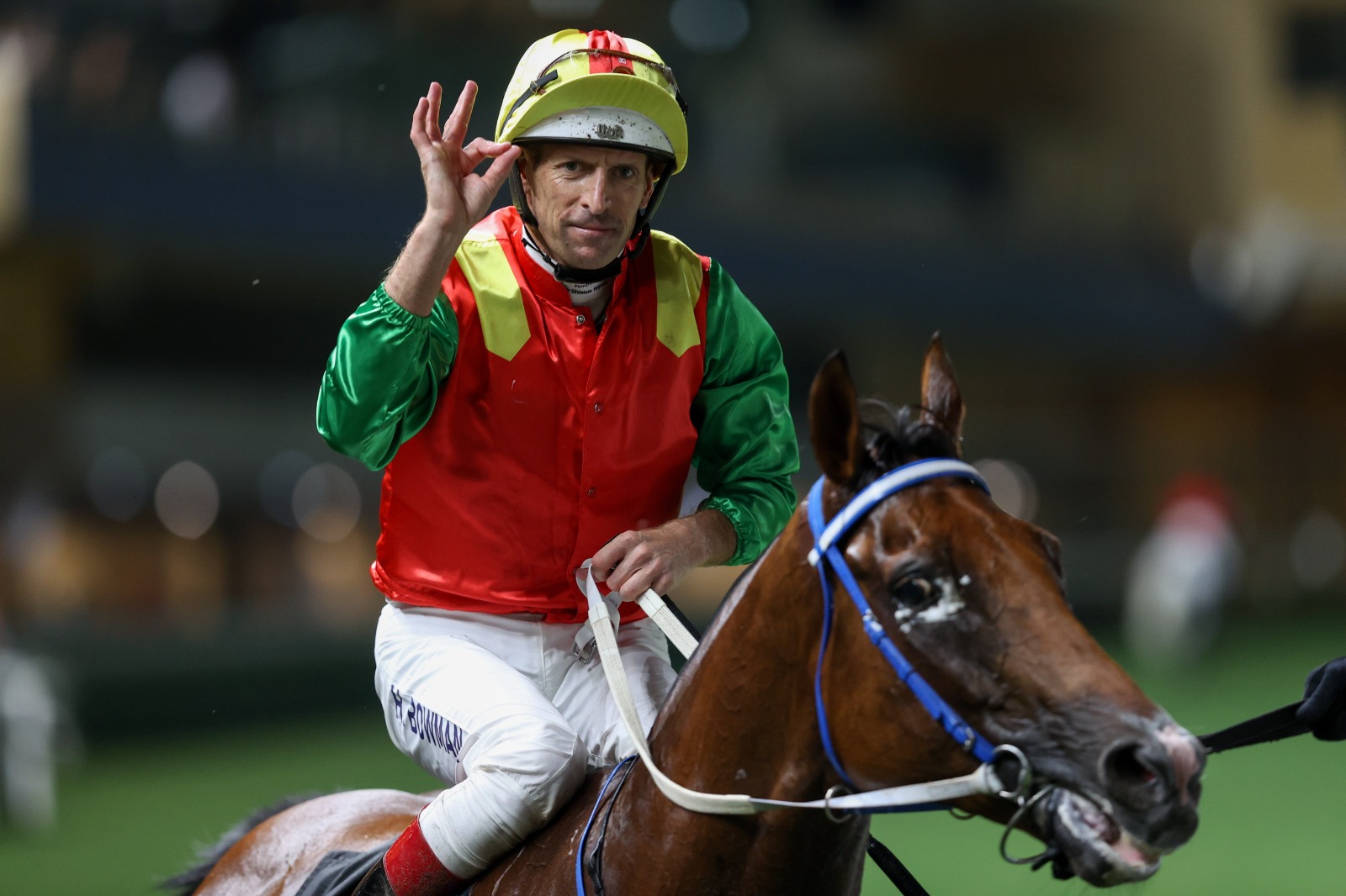 Hugh Bowman celebrates his treble at Happy Valley, marking a personal best season in Hong Kong