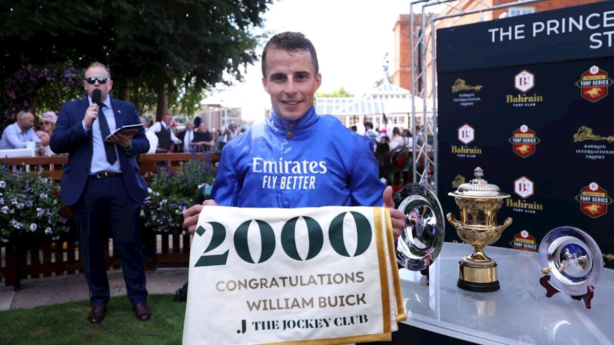 Racegoers at Newmarket enjoying the vibrant atmosphere during the 2025 Debenhams July Festival under sunny skies.
