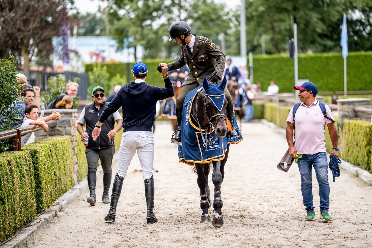Andres Azcarraga celebrates CSI4* Grand Prix victory with Contendros 2 at Longines Tops International Arena, narrowly defeating Harrie Smolders.