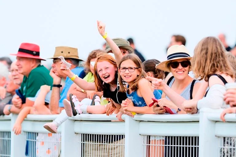 Families enjoying races, Shetland ponies, and carnival fun at Sandown Park Family Festival Friday, August 2025