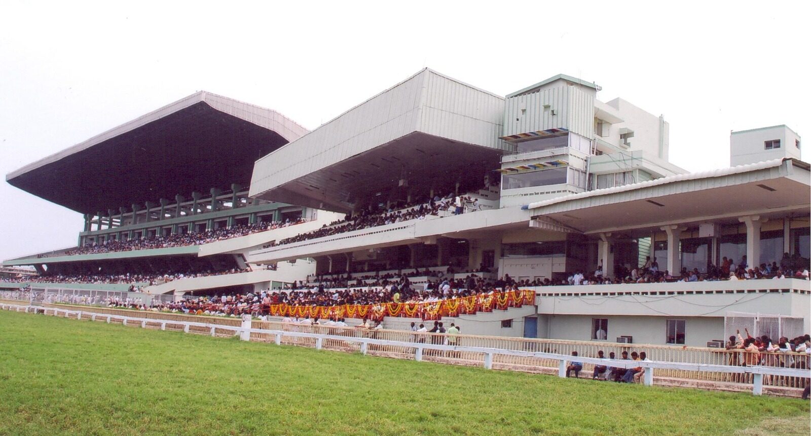 Horses lined up at the starting gates during Hyderabad Monsoon Races at Hyderabad Race Club