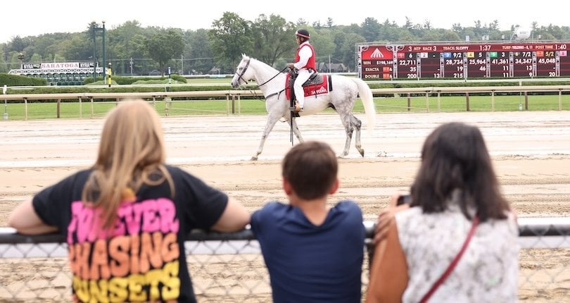 Horses at full stride at Saratoga Racecourse during August 13, 2025 meet