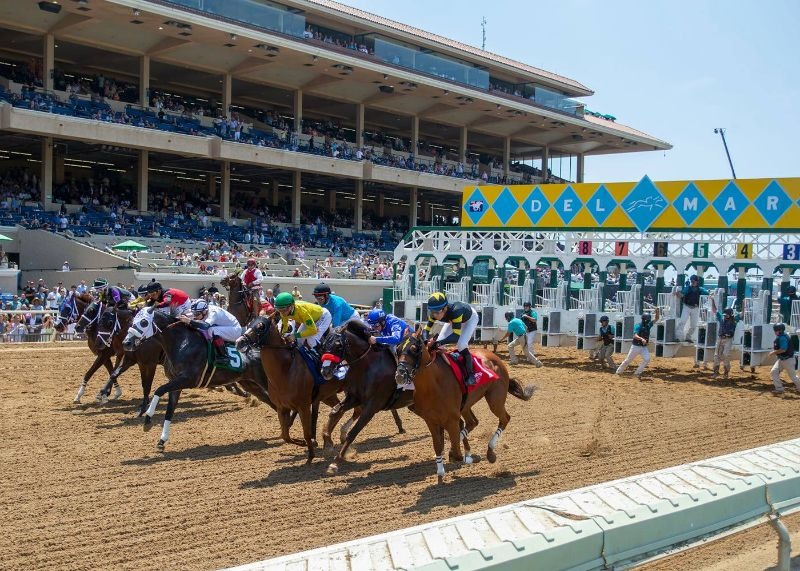 Umberto Rispoli celebrates after winning at Del Mar Racecourse on August 21, 2025