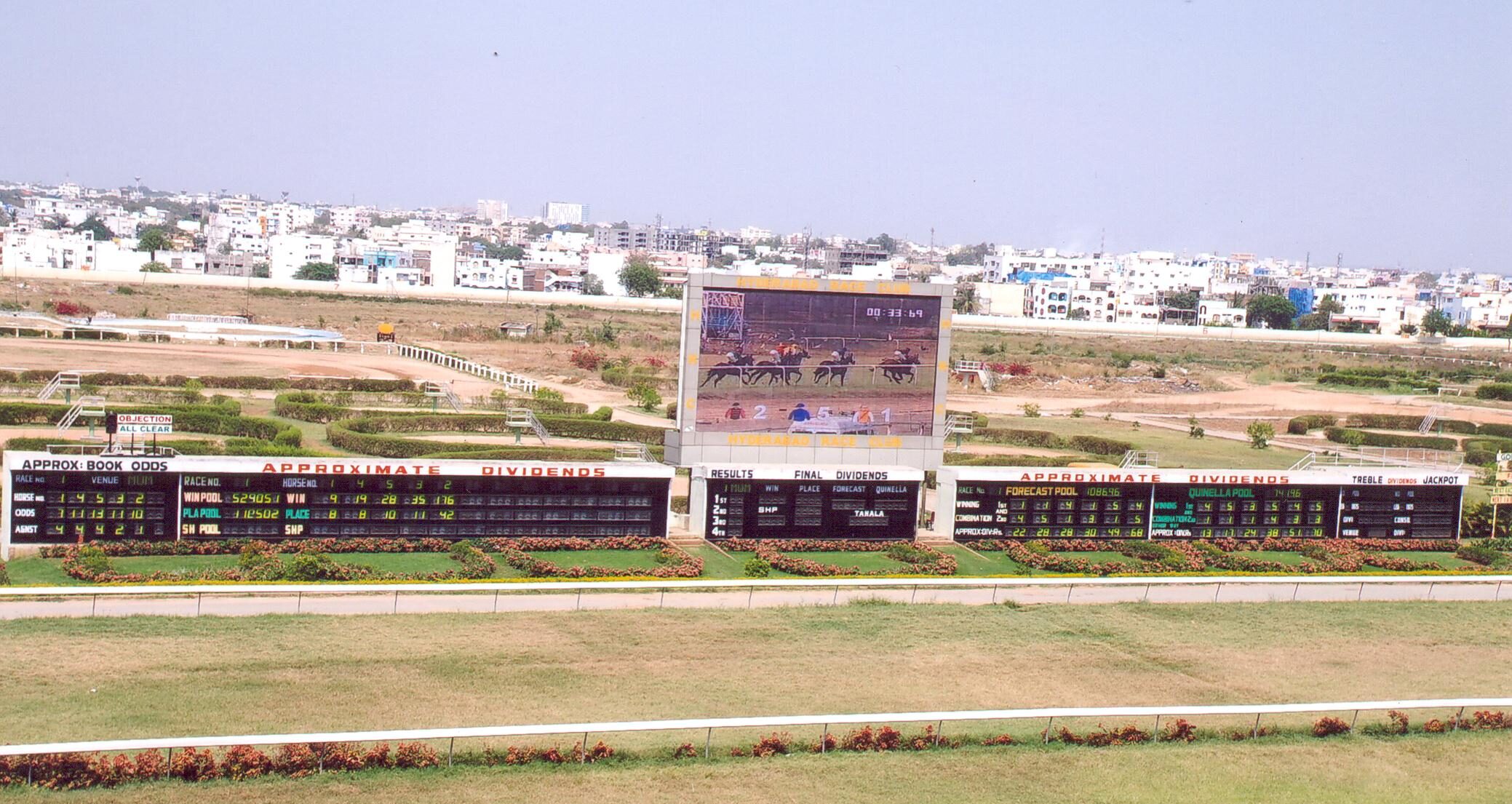 Action-packed scenes from Hyderabad Monsoon Races 2025, showing jockeys in action and horses sprinting toward the finish line