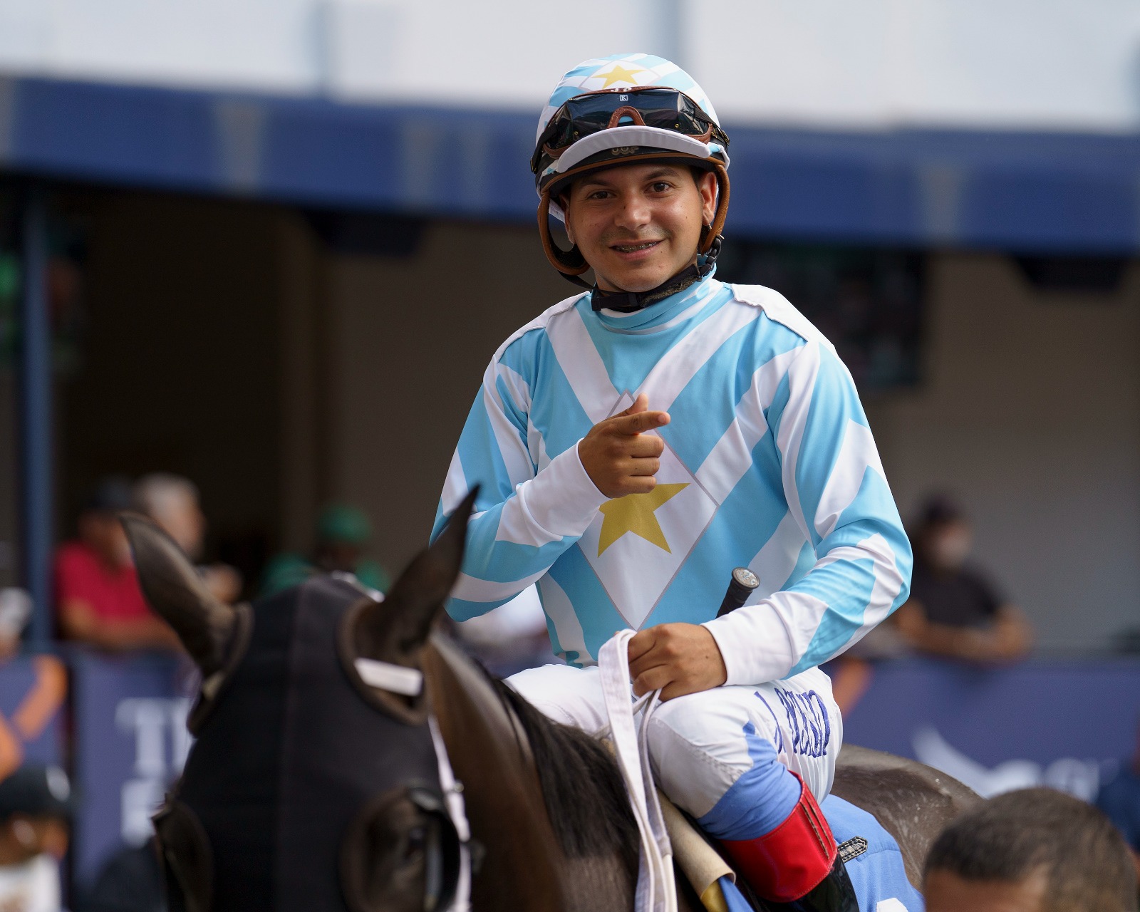 Jonathan Ocasio celebrates riding Squire ahead of the FTBOA Sire Stakes at Gulfstream Park 2025