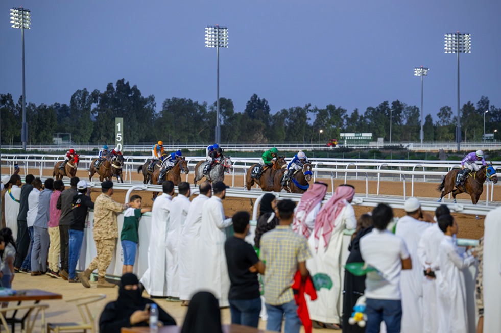 Taif Summer Race Night 2025 at King Khalid Racecourse with horses racing under lights