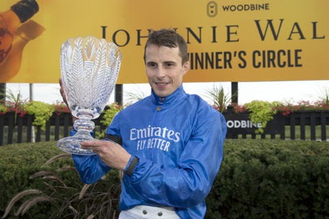 Notable Speech (GB) winning the Rogers Woodbine Mile under William Buick