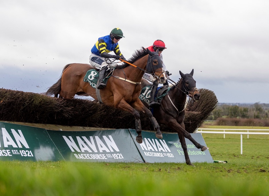 Horses jumping hurdles at Navan Racecourse during the National Hunt season opener