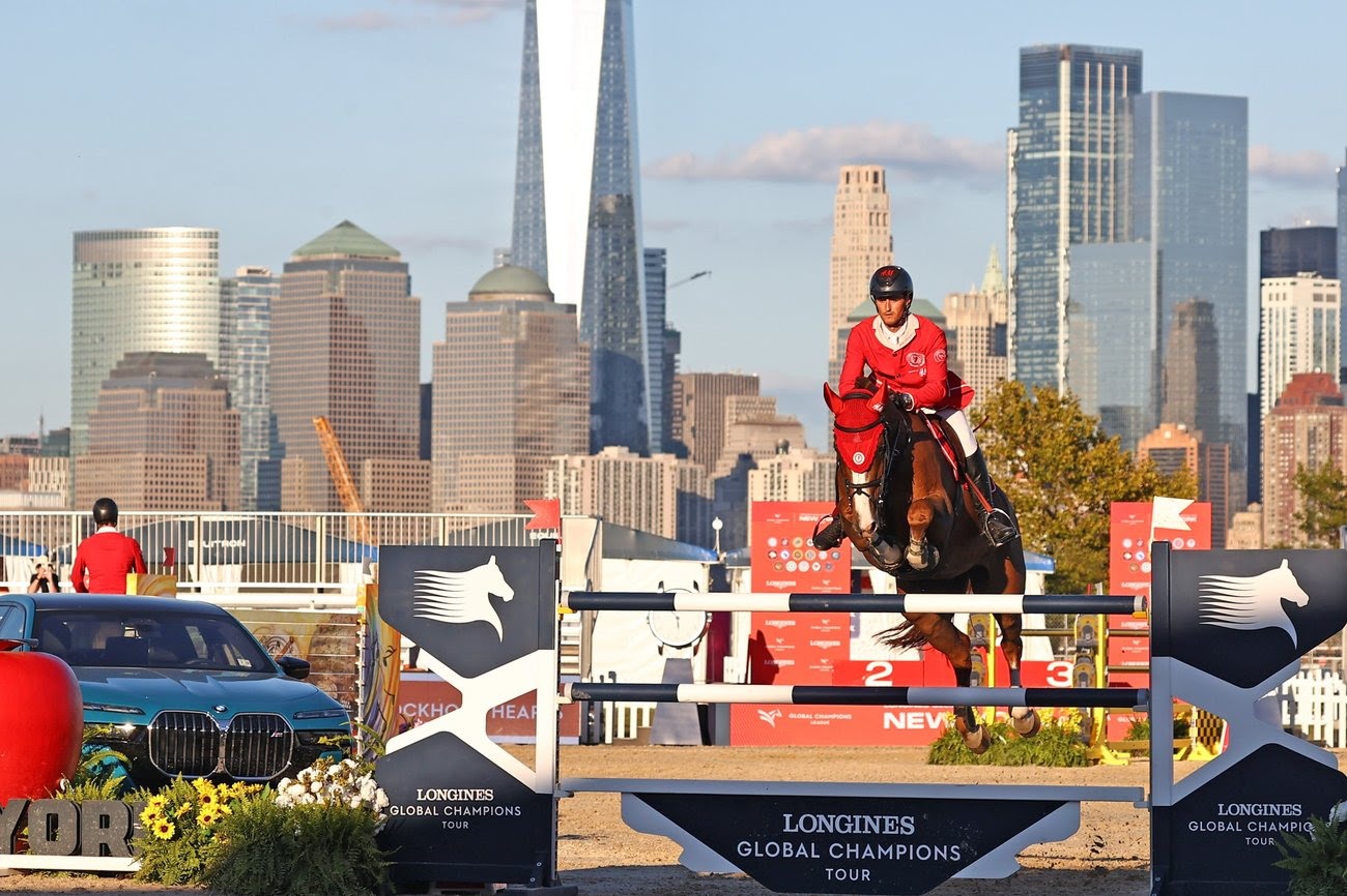 Stockholm Hearts celebrate victory in GCL New York 2025 at Liberty State Park under Manhattan skyline