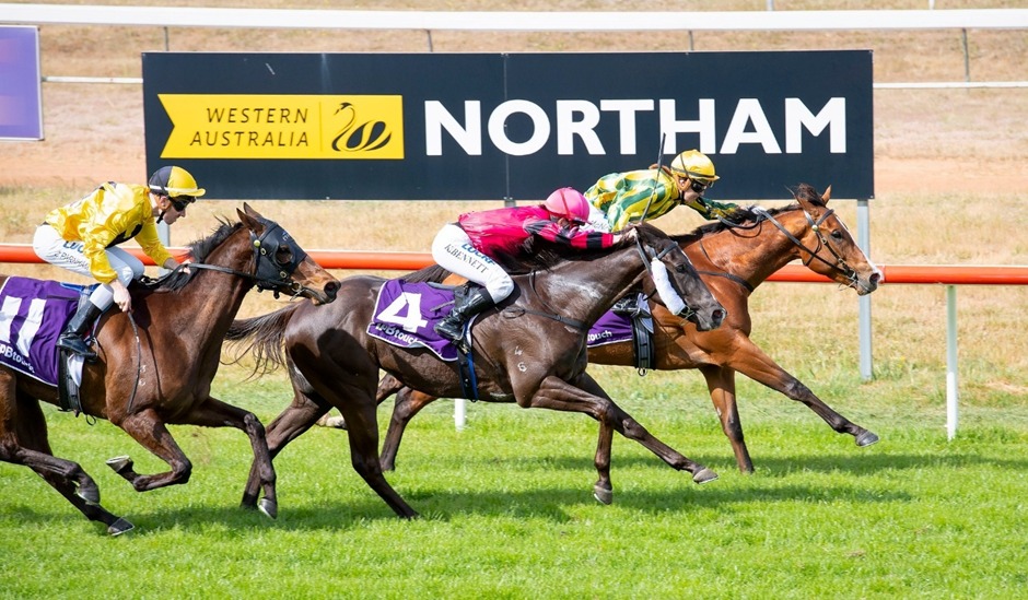 Horses racing at Northam Racecourse during the Spring Sunday Session 2025