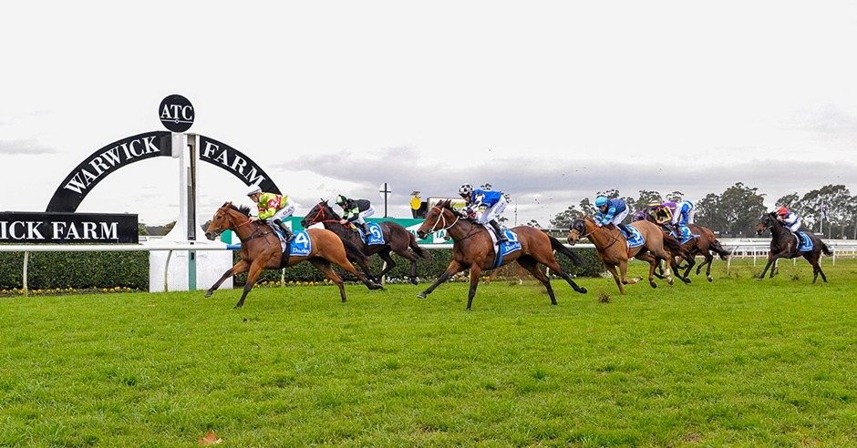 Labour Day 2025 at Warwick Farm Racecourse with horses racing under sunny skies