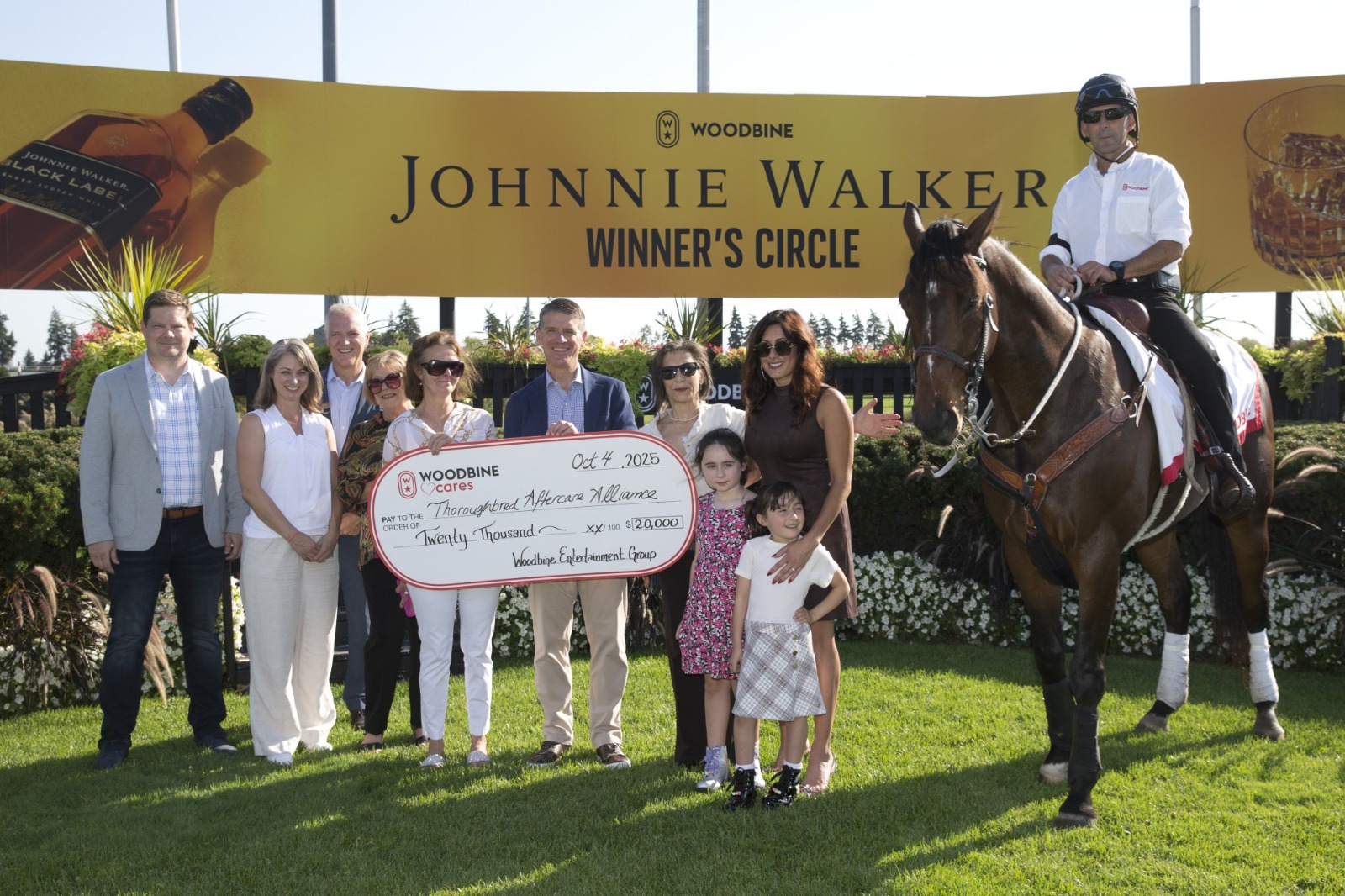 Michael Copeland presents $20,000 donation to Thoroughbred Aftercare Alliance at Woodbine Racetrack