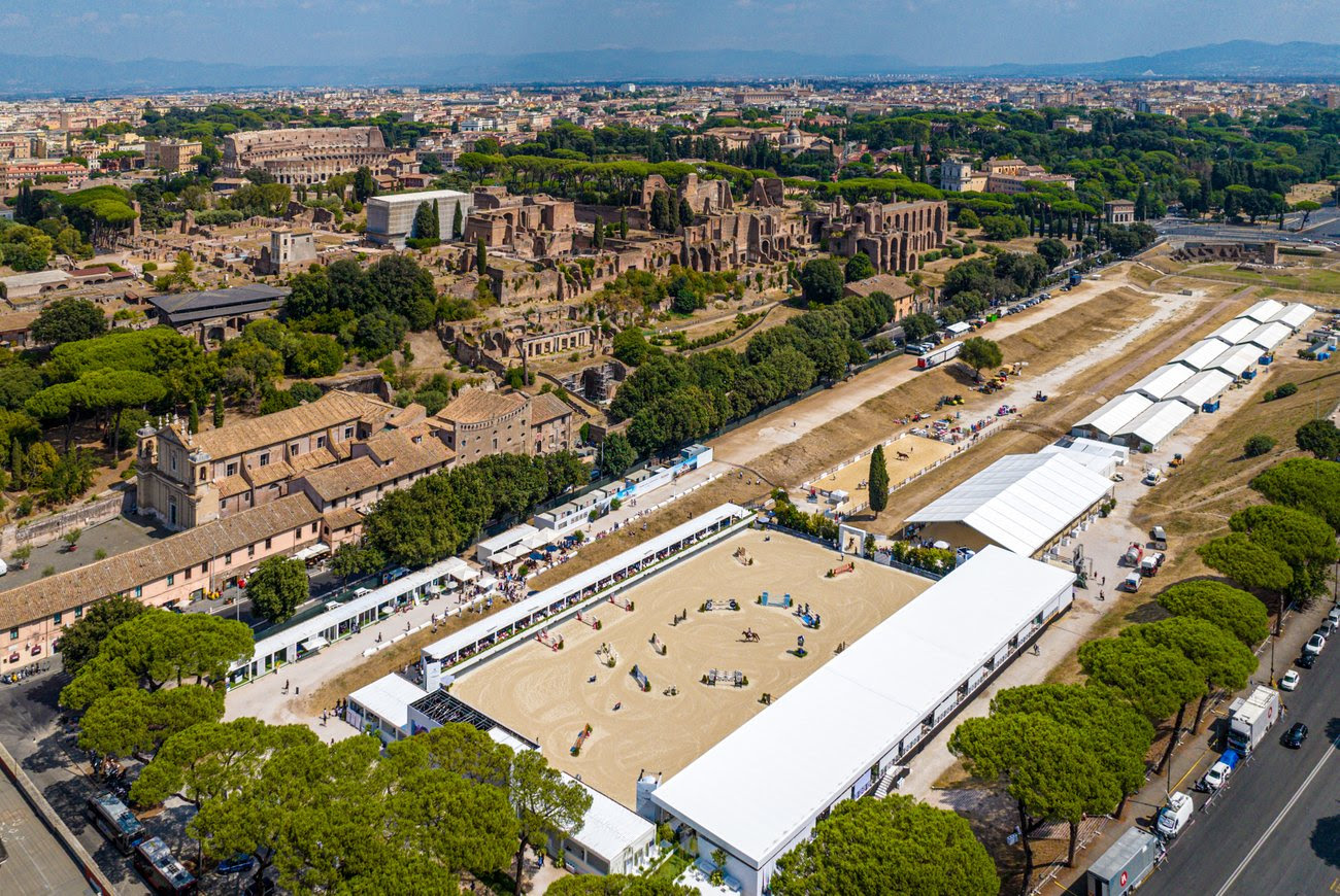 Riders compete in show jumping at the Longines Global Champions Tour Rome 2025 with Circus Maximus in the background