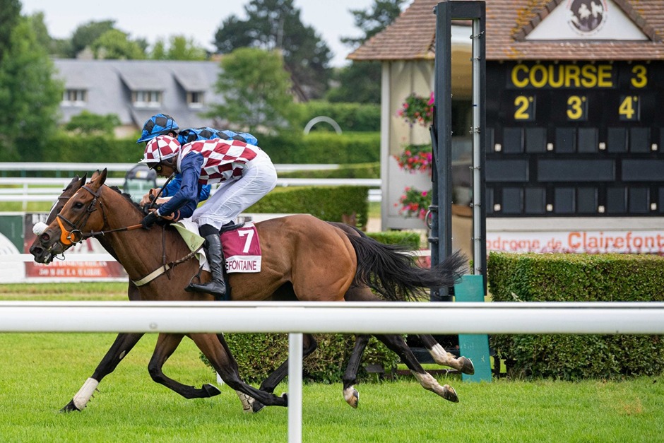 Clairefontaine Racecourse in Normandy with flat racing horses on the track, 21 October 2025