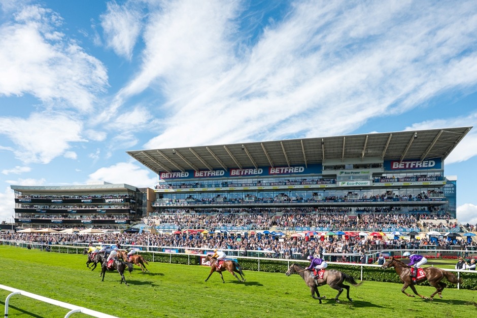 Horses racing at Doncaster Racecourse during William Hill Futurity Trophy Friday 2025