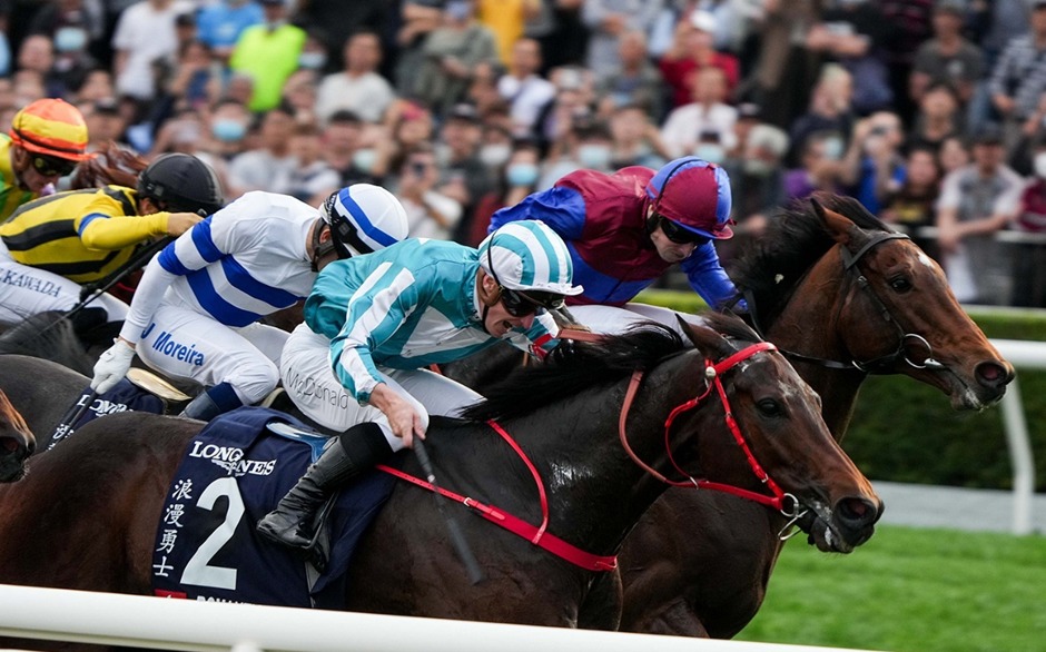 Horses racing under lights at Sha Tin Racecourse during the 2025 Premier Bowl