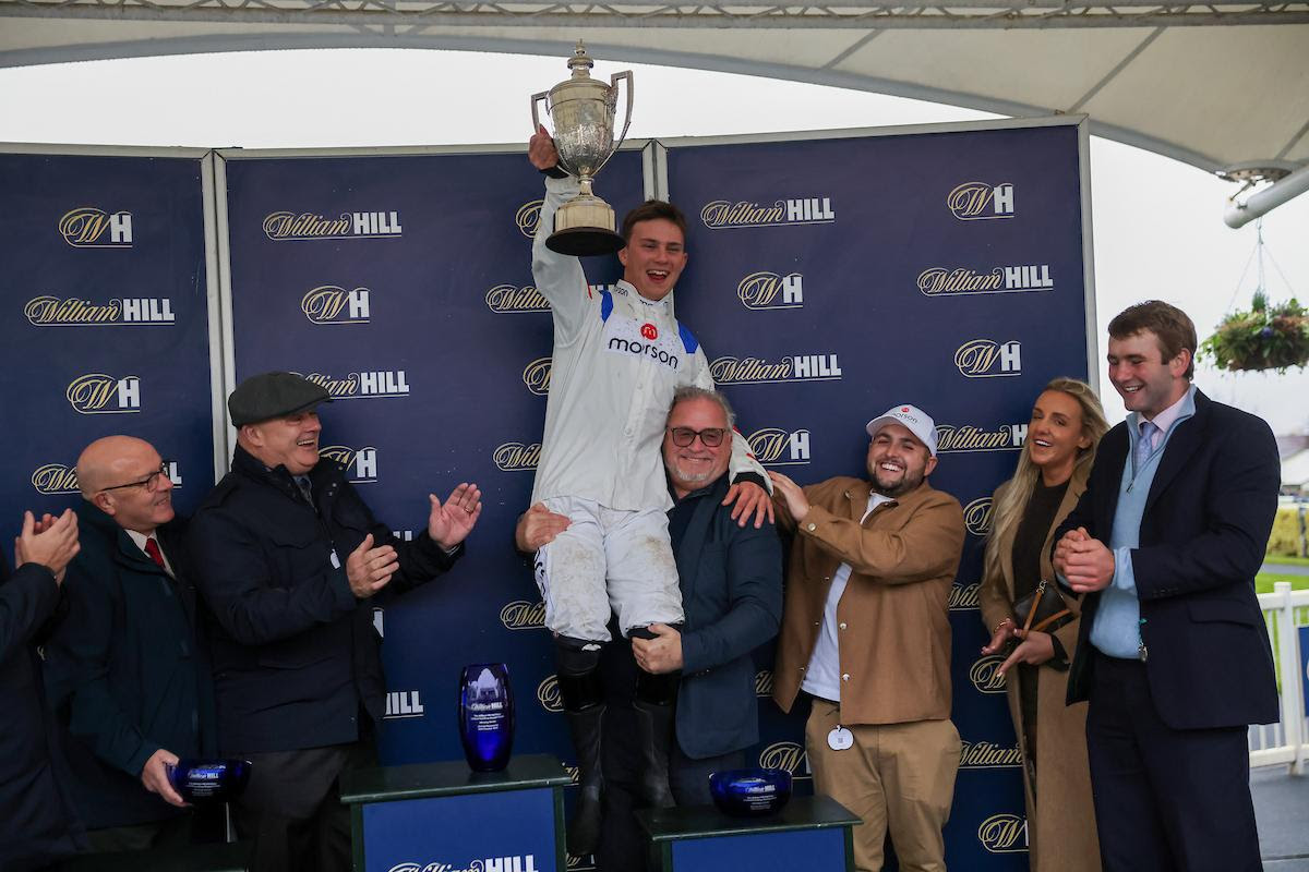 Hitman wins the Grade Two William Hill Old Roan Handicap Chase at Aintree for the Ricky Hatton Foundation.