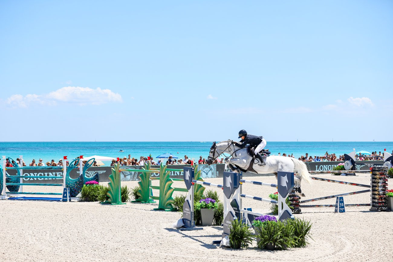 Horses and riders competing in the Longines Global Champions Tour at Miami Beach