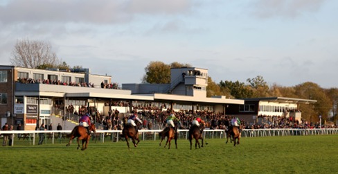 Horses warming up at Wolverhampton under floodlights