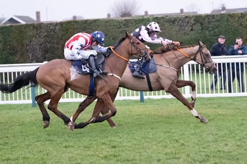 Hereford Race Cards 11 February with horses on track during jumps racing