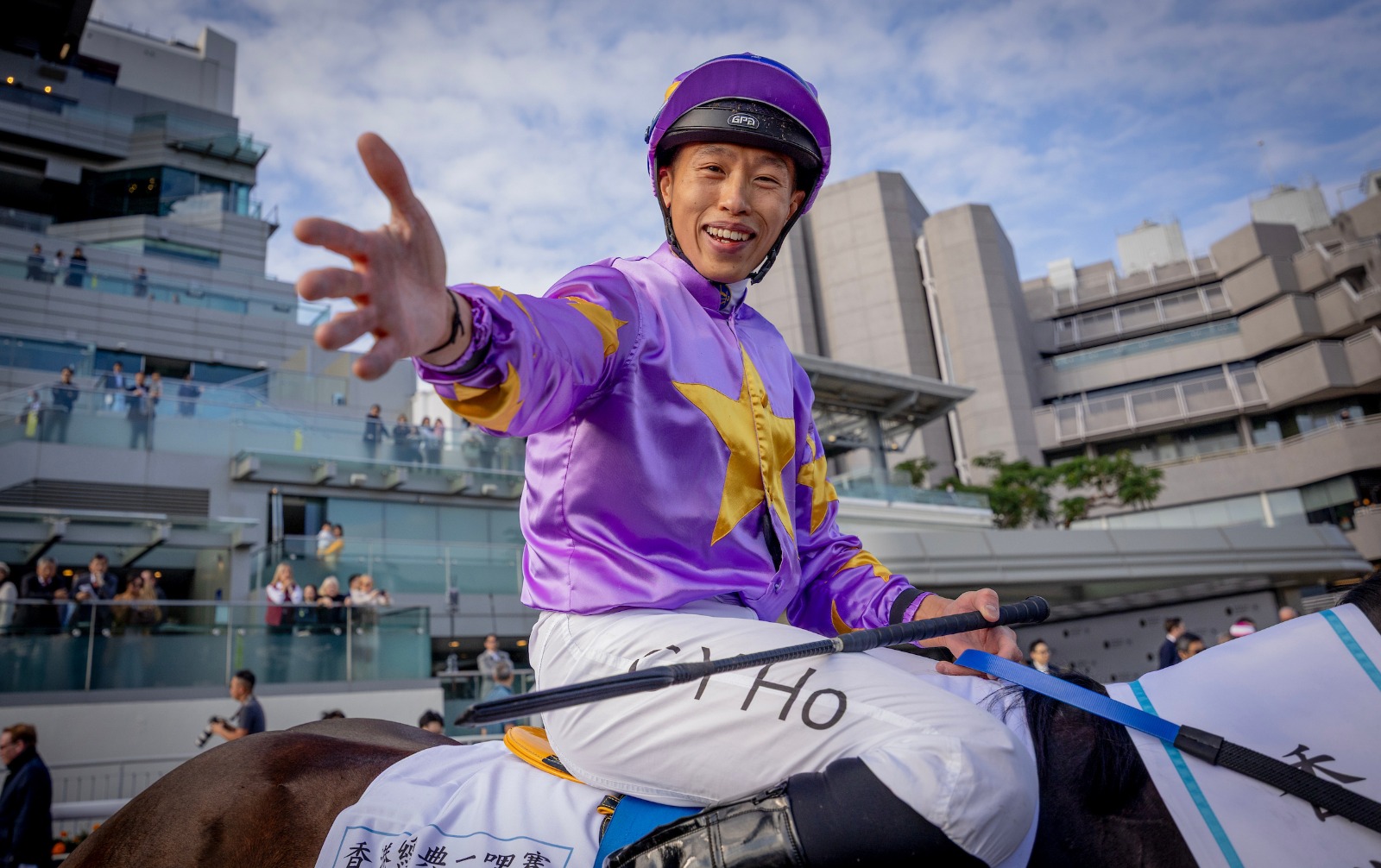 Little Paradise surging clear to win the Hong Kong Classic Mile at Sha Tin