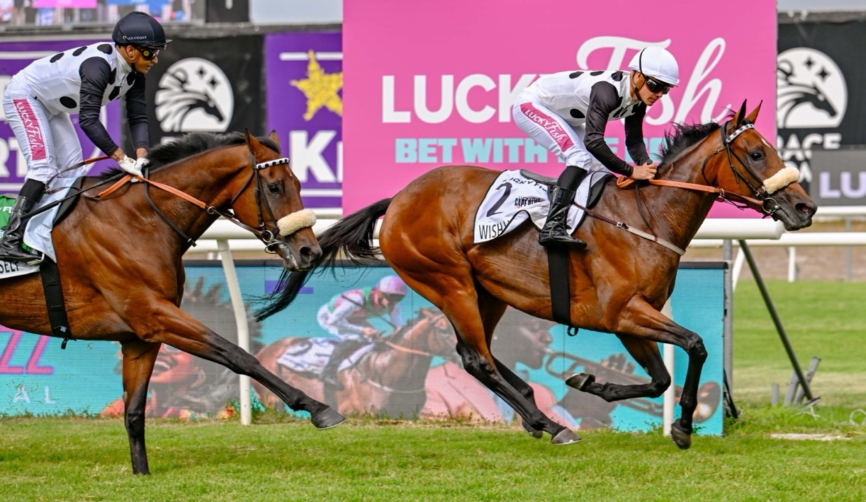 Wish List crossing the finish line at Hollywoodbets Kenilworth for the Lucky Fish Cape Derby