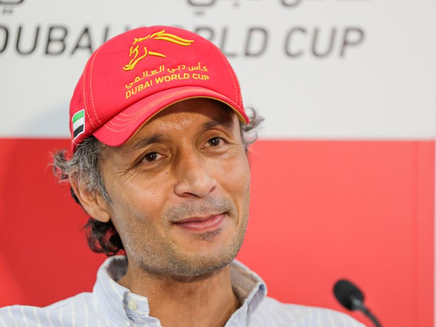 Bhupat Seemar with runners ahead of Dubai World Cup 2026 at Meydan