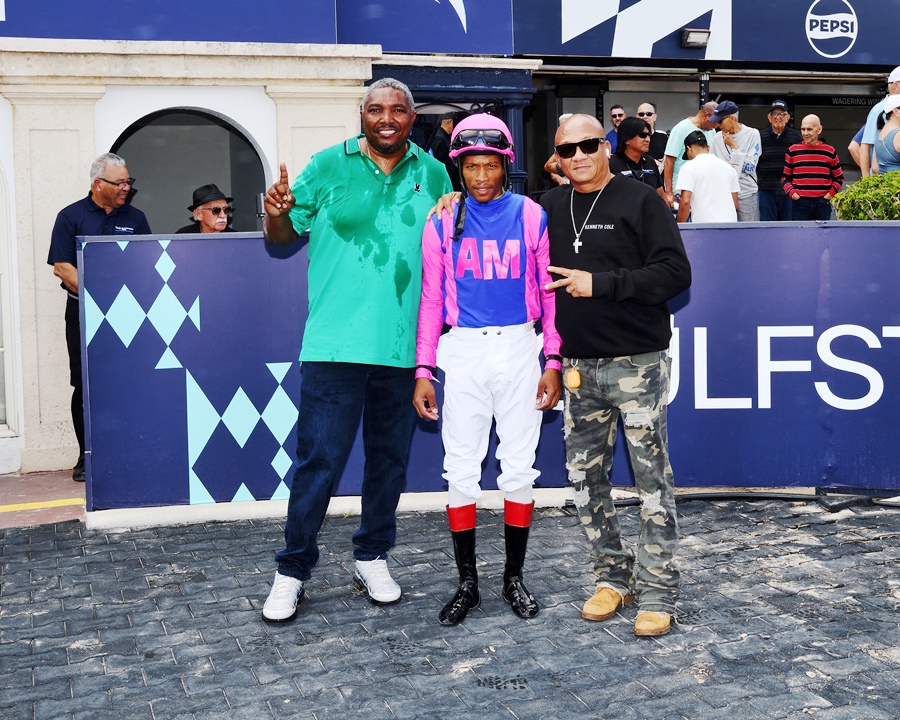 War to Remember winning at Gulfstream Park giving Christopher Hall first win