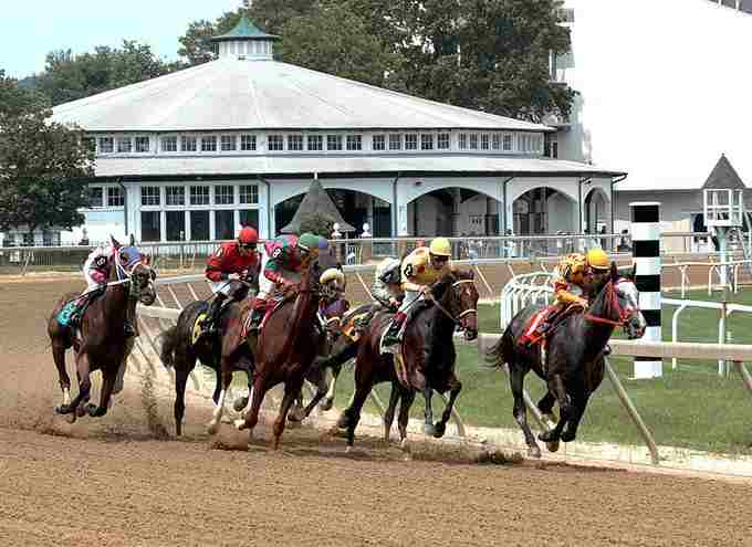 Childs Walker receiving Old Hilltop Award recognition at racing journalism ceremony