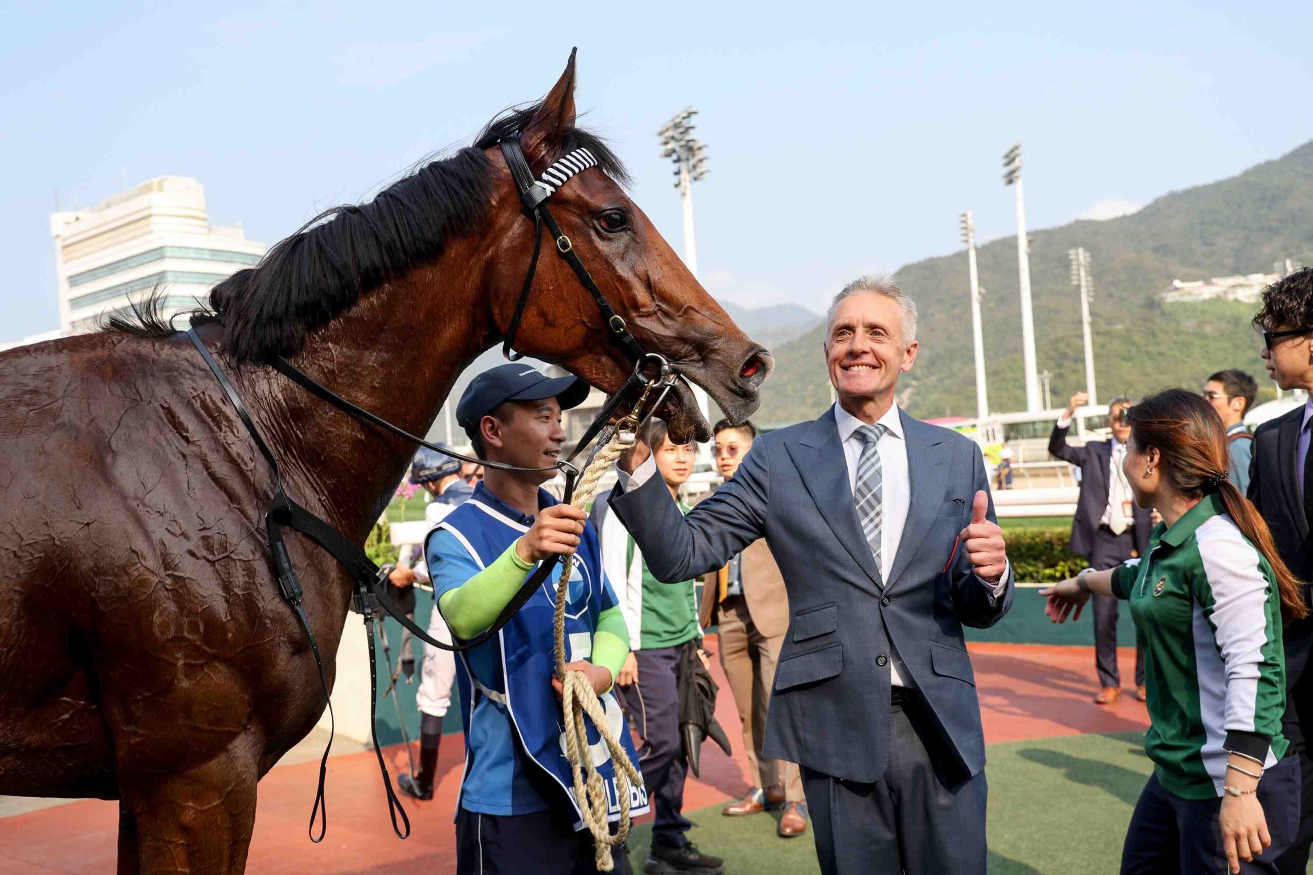Mark Newnham celebrates after a major Hong Kong racing victory with Invincible Ibis