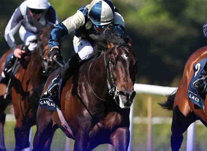 Winning horse crosses the finish line during Epsom Downs racing on 16 July 2026