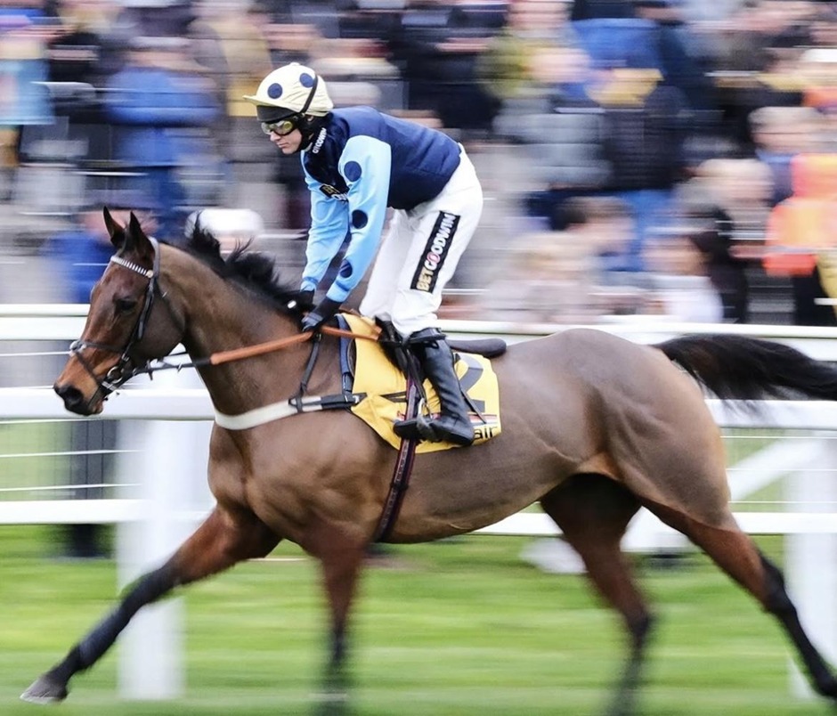 Winning horse crosses the finish line during Sandown Park racing on 29 July 2026