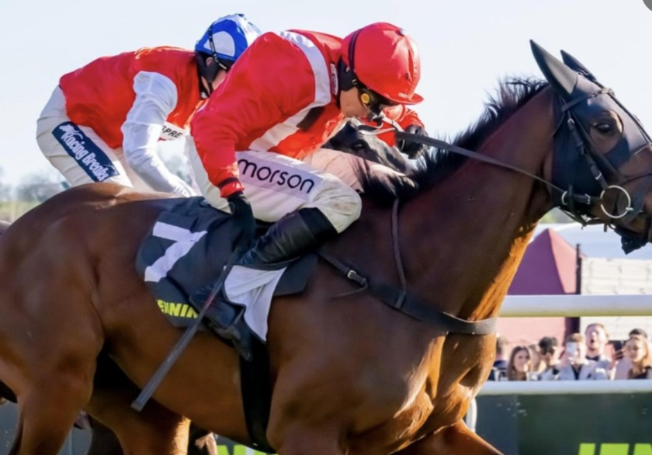 Winning horse crosses the finish line during Uttoxeter jump racing on 26 July 2026