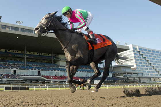 Luster winning the Woodbine Oaks 2026 under John Velazquez at Woodbine